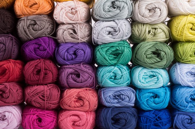 piles of yarn rainbow pile of yarn